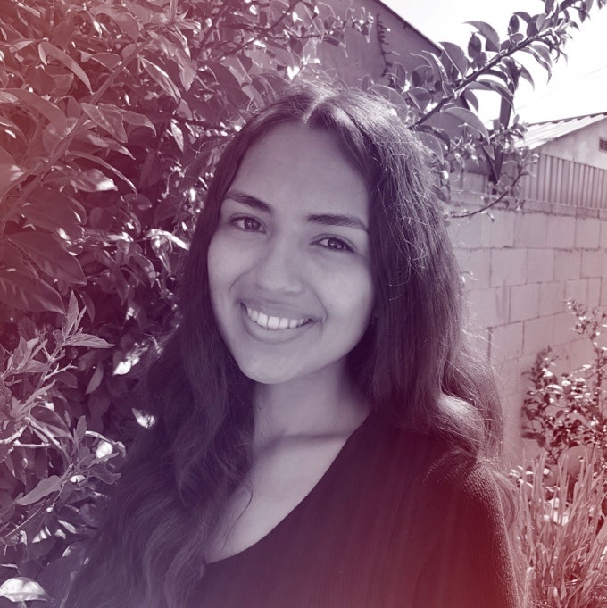 A photographic profile portrait of a young woman facing the camera.