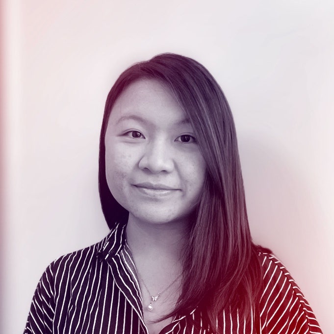 A photograhic profile portrait of a young woman facing the camera.