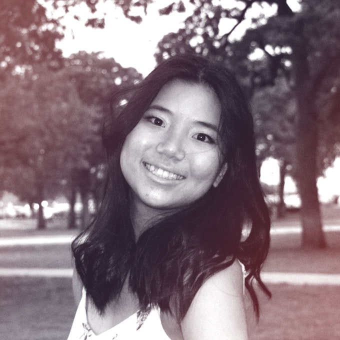 A photograhic profile portrait of a young woman facing the camera.