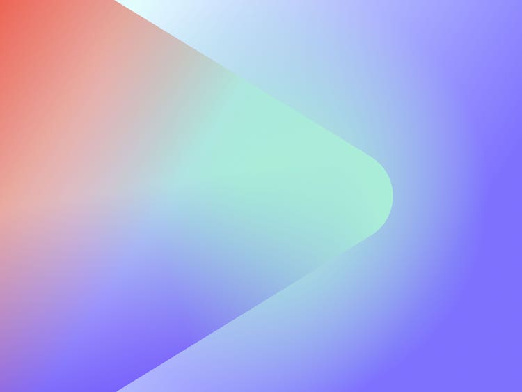 An orange-to-blue-to-green gradient in the triangular shape of a "play button" on a light-to-darker blue gradient background.