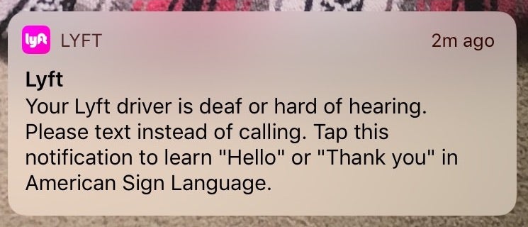 A push notification that reads, "Your Lyft driver is deaf or hard of hearing. Please text instead of calling. Tap this notification to learn "Hello" or "Thank you" in American Sign Language.