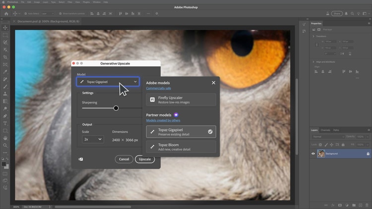 The Adobe Photoshop UI showing the Generative Upscale dialog over a close-up of an owl’s eye. The dialog lists model options: Topaz Gigapixel (selected), Firefly Upscaler, and Topaz Bloom. Additional settings include a sharpening slider, an output scale set to 2x, and dimensions 2400 × 3066px. Cancel and Upscale buttons are at the bottom.