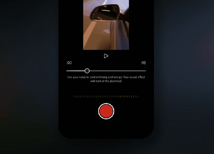 A GIF of a smartphone screen showing a video editing app with a vertical preview of a car’s side mirror and door. Below the preview is a play button and a timeline slider marked from 0 to 16 seconds. Instructional text reads: "Use your voice to control timing and energy. Your sound effect will start at the playhead." A green audio level indicator appears above a large red record button at the bottom.
